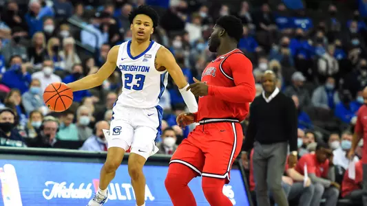 Jan 19, 2022; Omaha, Nebraska, USA;  Creighton Bluejays guard Trey Alexander (23) brings the ball up the court against St. John's Red Storm guard Dylan Addae-Wusu (5) in the second half at CHI Health Center Omaha. Mandatory Credit: Steven Branscombe-USA TODAY Sports