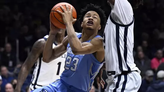Jan 26, 2022; Indianapolis, Indiana, USA; Creighton Bluejays guard Trey Alexander (23) drives toward the basket against Butler Bulldogs guard Jayden Taylor (13) during the second half of the game at Hinkle Fieldhouse. Bulldogs won 72-55. Mandatory Credit: Marc Lebryk-USA TODAY Sports