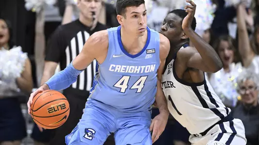 Jan 26, 2022; Indianapolis, Indiana, USA; Creighton Bluejays forward Ryan Hawkins (44) defends Butler Bulldogs guard Bo Hodges (1) during the first half at Hinkle Fieldhouse. Mandatory Credit: Marc Lebryk-USA TODAY Sports