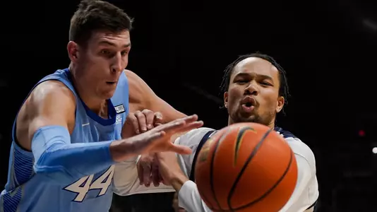 Butler Bulldogs guard Jair Bolden (52) loses control of the ball against Creighton Bluejays forward Ryan Hawkins (44) on Wednesday, Jan. 26, 2022, at Hinkle Fieldhouse in Indianapolis. Butler Bulldogs lead at the half against the Creighton Bluejays, 27-24.
Ncaa Butler Bulldogs Vs Creighton Bluejays