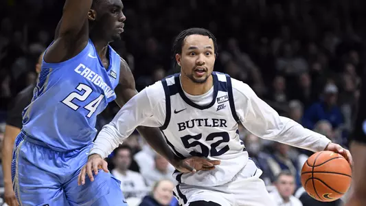 Jan 26, 2022; Indianapolis, Indiana, USA; Butler Bulldogs guard Aaron Thompson (2) is guarded by Creighton Bluejays forward Arthur Kaluma (24) during the first half at Hinkle Fieldhouse. Mandatory Credit: Marc Lebryk-USA TODAY Sports