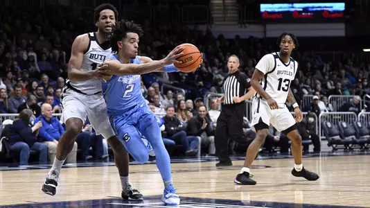 Jan 26, 2022; Indianapolis, Indiana, USA; Creighton Bluejays guard Ryan Nembhard (2) passes away from Butler Bulldogs forward Bryce Nze (10) during the second half at Hinkle Fieldhouse. Bulldogs won 72-55. Mandatory Credit: Marc Lebryk-USA TODAY Sports