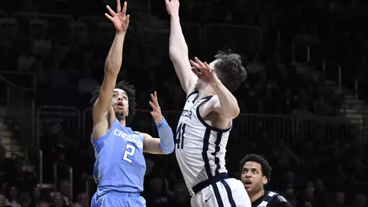 Jan 26, 2022; Indianapolis, Indiana, USA; Creighton Bluejays guard Ryan Nembhard (2) takes a shot over Butler Bulldogs guard Simas Lukosius (41) during the second half at Hinkle Fieldhouse. Bulldogs won 72-55. Mandatory Credit: Marc Lebryk-USA TODAY Sports