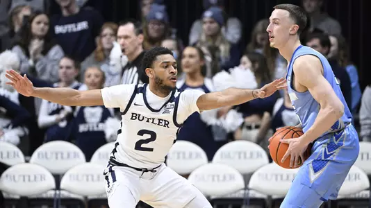 Jan 26, 2022; Indianapolis, Indiana, USA; Butler Bulldogs guard Aaron Thompson (2) defends Creighton Bluejays guard Alex O'Connell (5) during the first half at Hinkle Fieldhouse. Mandatory Credit: Marc Lebryk-USA TODAY Sports