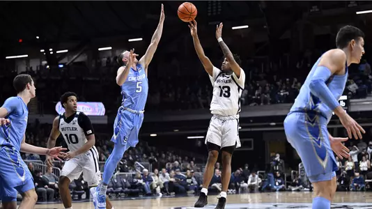 Jan 26, 2022; Indianapolis, Indiana, USA; Butler Bulldogs guard Jayden Taylor (13) takes a shot over Creighton Bluejays guard Alex O'Connell (5) during the first half at Hinkle Fieldhouse. Mandatory Credit: Marc Lebryk-USA TODAY Sports