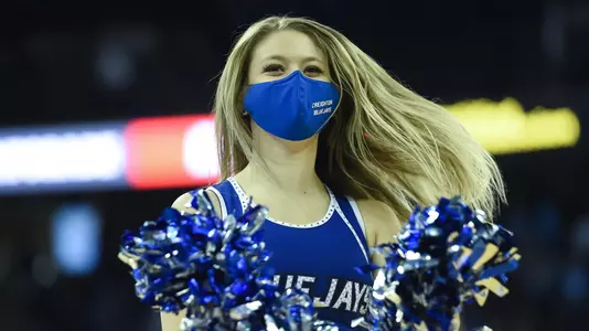 Feb 14, 2022; Omaha, Nebraska, USA; A cheerleader for the Creighton Bluejays performs during a break in the game against the Georgetown Hoyas in the second half at CHI Health Center Omaha. Mandatory Credit: Steven Branscombe-USA TODAY Sports