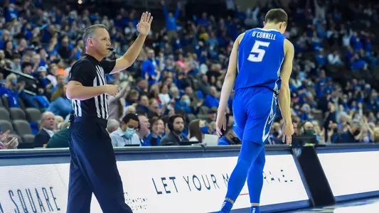 Feb 14, 2022; Omaha, Nebraska, USA; Creighton Bluejays guard Alex O'Connell (5) reacts after hitting a three point basket against the Georgetown Hoyas in the first half at CHI Health Center Omaha. Mandatory Credit: Steven Branscombe-USA TODAY Sports