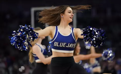 Mar 19, 2022; Fort Worth, TX, USA; Creighton Bluejays cheerleaders perform against the Kansas Jayhawks during the second round of the 2022 NCAA Tournament at Dickies Arena. Mandatory Credit: Chris Jones-USA TODAY Sports