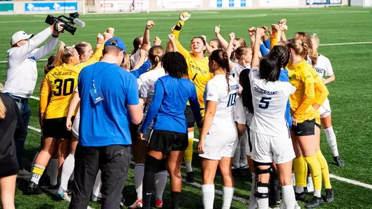 Women's Soccer Team Huddle
