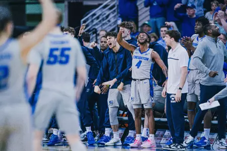 Shereef Mitchell and the bench are excited