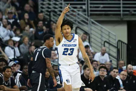 Mar 1, 2023; Omaha, Nebraska, USA; Creighton Bluejays guard Trey Alexander (23) reacts after a three point basket against the Georgetown Hoyas in the first half at CHI Health Center Omaha. Mandatory Credit: Steven Branscombe-USA TODAY Sports