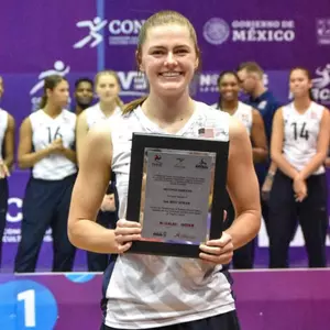 Norah Sis with award