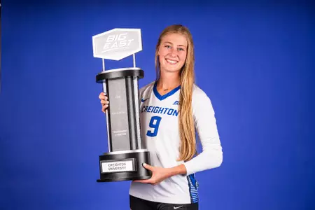 Kiana Schmitt with BIG EAST trophy