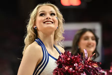 Jan 27, 2024; Omaha, Nebraska, USA; Creighton Bluejays  cheerleader performs during a break in the game against the DePaul Blue Demons in the first half at CHI Health Center Omaha. Mandatory Credit: Steven Branscombe-USA TODAY Sports
