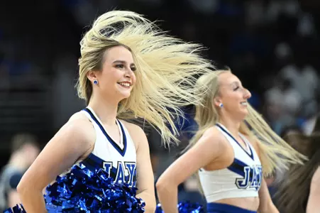 Feb 13, 2024; Omaha, Nebraska, USA;  A cheerleader for the Creighton Bluejays performs during a break in the game against the Georgetown Hoyas in the second half at CHI Health Center Omaha. Mandatory Credit: Steven Branscombe-USA TODAY Sports