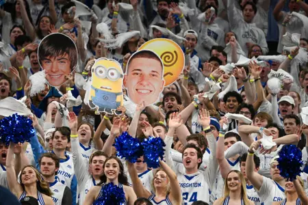 Mar 2, 2024; Omaha, Nebraska, USA; Creighton Bluejays students cheer against the Marquette Golden Eagles in the second half at CHI Health Center Omaha. Mandatory Credit: Steven Branscombe-USA TODAY Sports