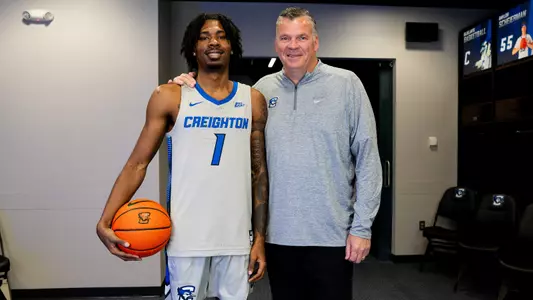 Jamiya Neal with Greg McDermott