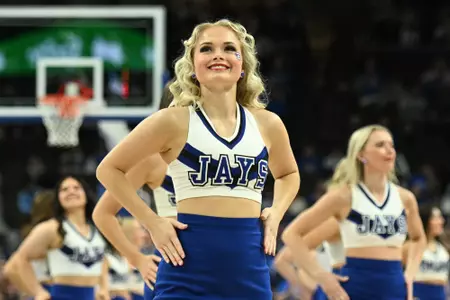 Jan 14, 2025; Omaha, Nebraska, USA;  Cheerleaders for the Creighton Bluejays perform during a break in the game against the Providence Friars during the second half at CHI Health Center Omaha. Mandatory Credit: Steven Branscombe-Imagn Images