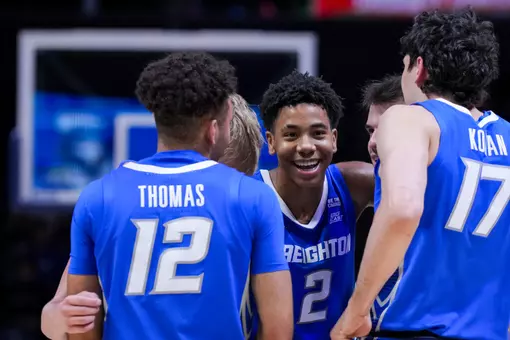 Dec 17, 2025; Cincinnati, Ohio, USA; Creighton Bluejays guard Blake Harper (2) smiles in a team huddle during a stop in play against the Xavier Musketeers in the second half at the Cintas Center. Mandatory Credit: Aaron Doster-Imagn Images