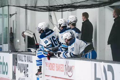 PCS MHockey Team on the Bench