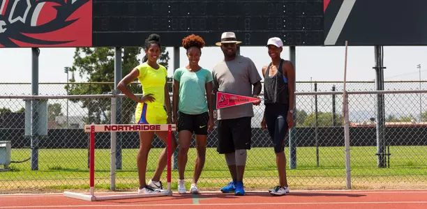 Lawrence Johnson and three Olympic Hurdlers cropped