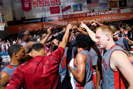 Men's Basketball Huddle vs. Life Pacific