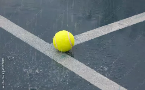 Tennis Ball in the Rain