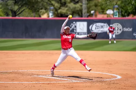 Isabella Alonso pitching the ball.