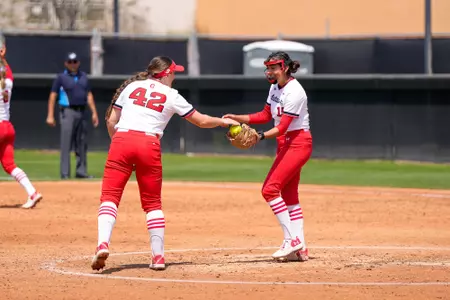 The team high-fiving