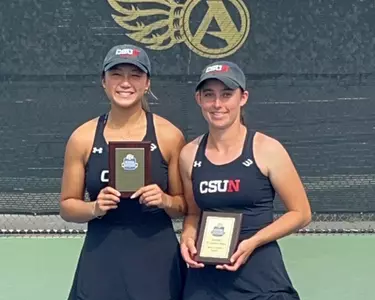 Nicole West and Angela Ho Posing with Trophy