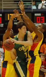 Jason Smith is double teamed by Iowa State's Will Blalock,left, and Rahshon Clark,right, during the championship basketball game of the 42nd Outrigger Hotels Rainbow Classic. (AP Photo Ronen Zilberman)