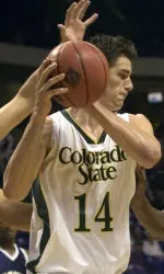 Jason Smith tries to keep the ball away from the Rice defense in the second half. (AP Photo)