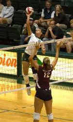 Whitney hits the books as well as the volleyball.