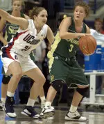 Kelly Jo Mullaney is guarded by Connecticut's Mel Thomas in the first half. (AP Photo/Jessica Hill)