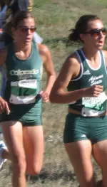 Thomas prepares to pass an Adams State runner