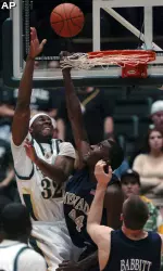 Colorado State's Andy Ogide, left, battles Nevada defender Dario Hunt. (AP Photo/The Fort Collins Coloradoan, Rich Abrahamson)