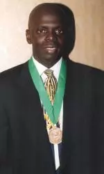 Eddie Hughes receiving his Hall of Fame medal