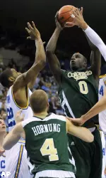 Forward Mame Bocar Ba shoots over UCLA center J'mison Morgan in the first half.
