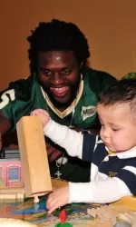 Johnson joined several CSU players at an Albuquerque children's hospital prior to the New Mexico Bowl