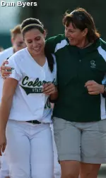 Head Coach Mary Yori and pitcher Kim Klabough celebrate a Rams victory.