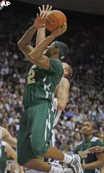 Colorado State's Andy Ogide shoots over BYU's Chris Miles.