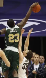 Colorado State's Will Bell blocks the shot of BYU's Jimmer Fredette.