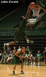 Jon Octeus dunks over Taylor Varsho on Monday night
