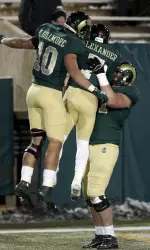 Donnell Alexander, Crockett Gillmore and Joe Caprioglio celebrate a touchdown.