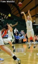 Kim Mestdagh shooting while Hayley Thompson gets fouled