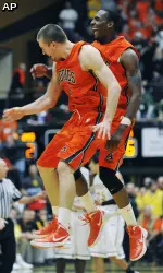 Colorado State's Pierce Hornung, left, and Greg Smith celebrate during their team's 54-46 win.
