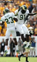 DE Lanston Tanyi (91), pictured with CB Bernard Blake, has 18 tackles in the last two games.