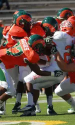 Aaron Davis (37) and the CSU defense must swarm to the ball to counter Wyoming's offensive weapons on Saturday.
