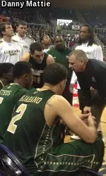 CSU Head Coach Larry Eustachy addresses the team in a huddle at Nevada.