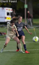 Amy Eckert battles for possession vs. Utah State